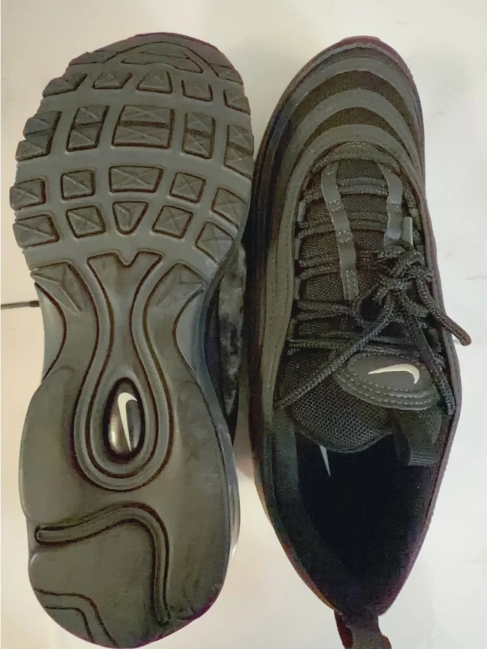 Nike Men’s Black Sneakers with White Swoosh